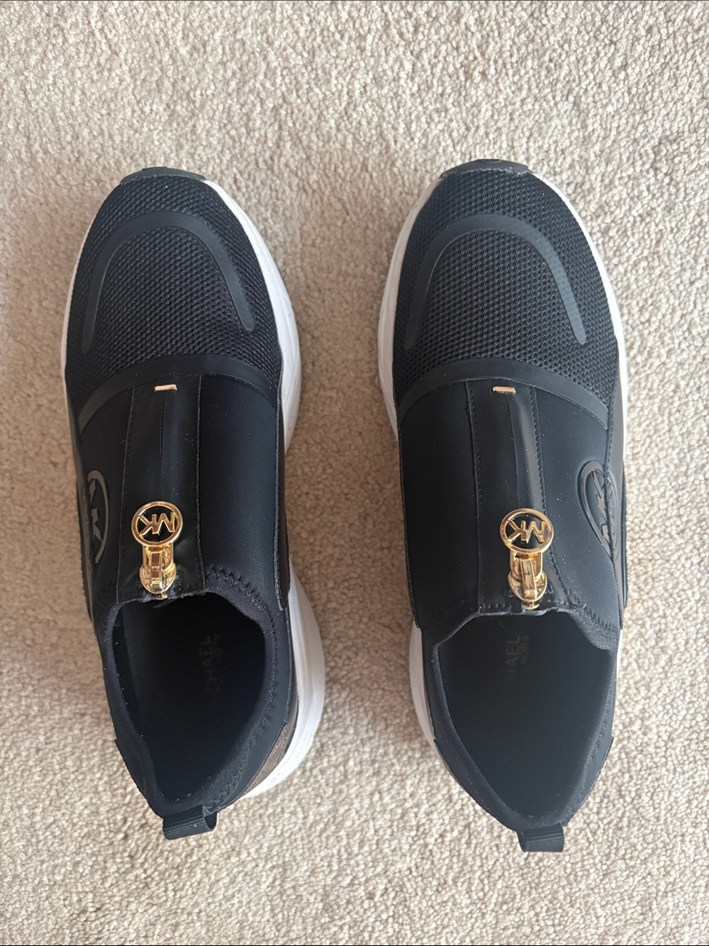Michael Kors Black and White Women’s Slip-On Sneakers with Gold Logo